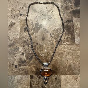 Amber Pendant Necklace with Silver Accents